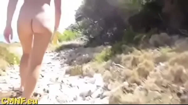 Candid nudist teen goes for a walk