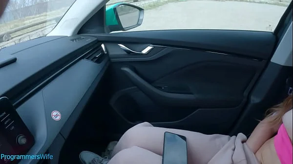 Teen masturbates on a public car park watching her porn video - ProgrammersWife